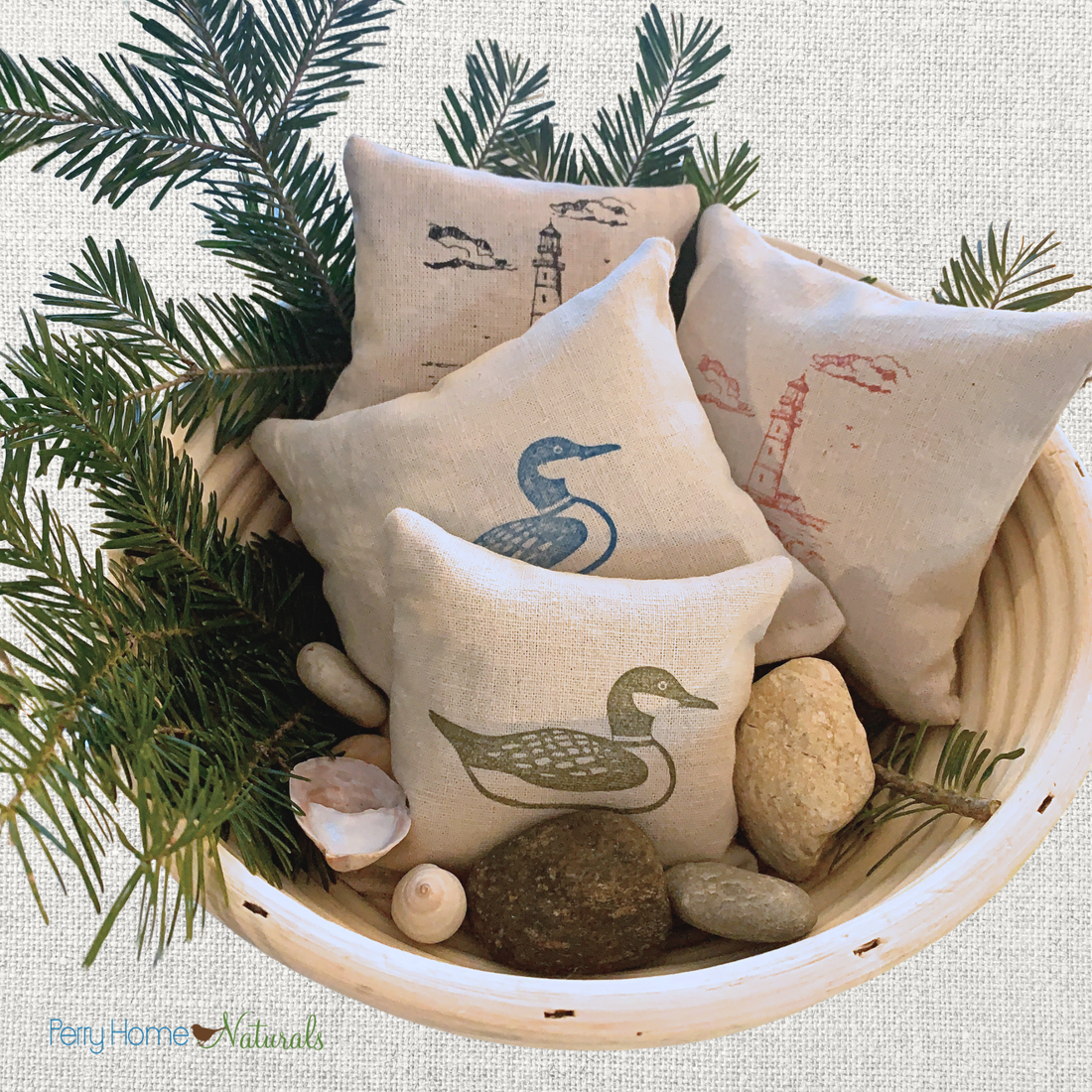 balsam fir and lavender sachets with loons and lighthouses inked onto natural essex linen.